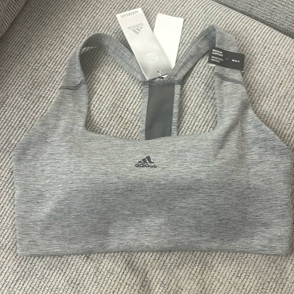 Adidas sports bra medium support. Padded brand new with tags still attached